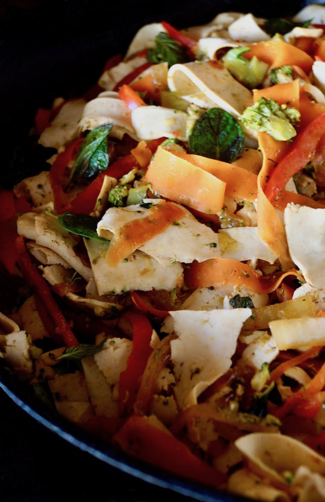 Vegetarian Mint Stir Fry Recipe wtih Tofu Noodles in a black saute pan.