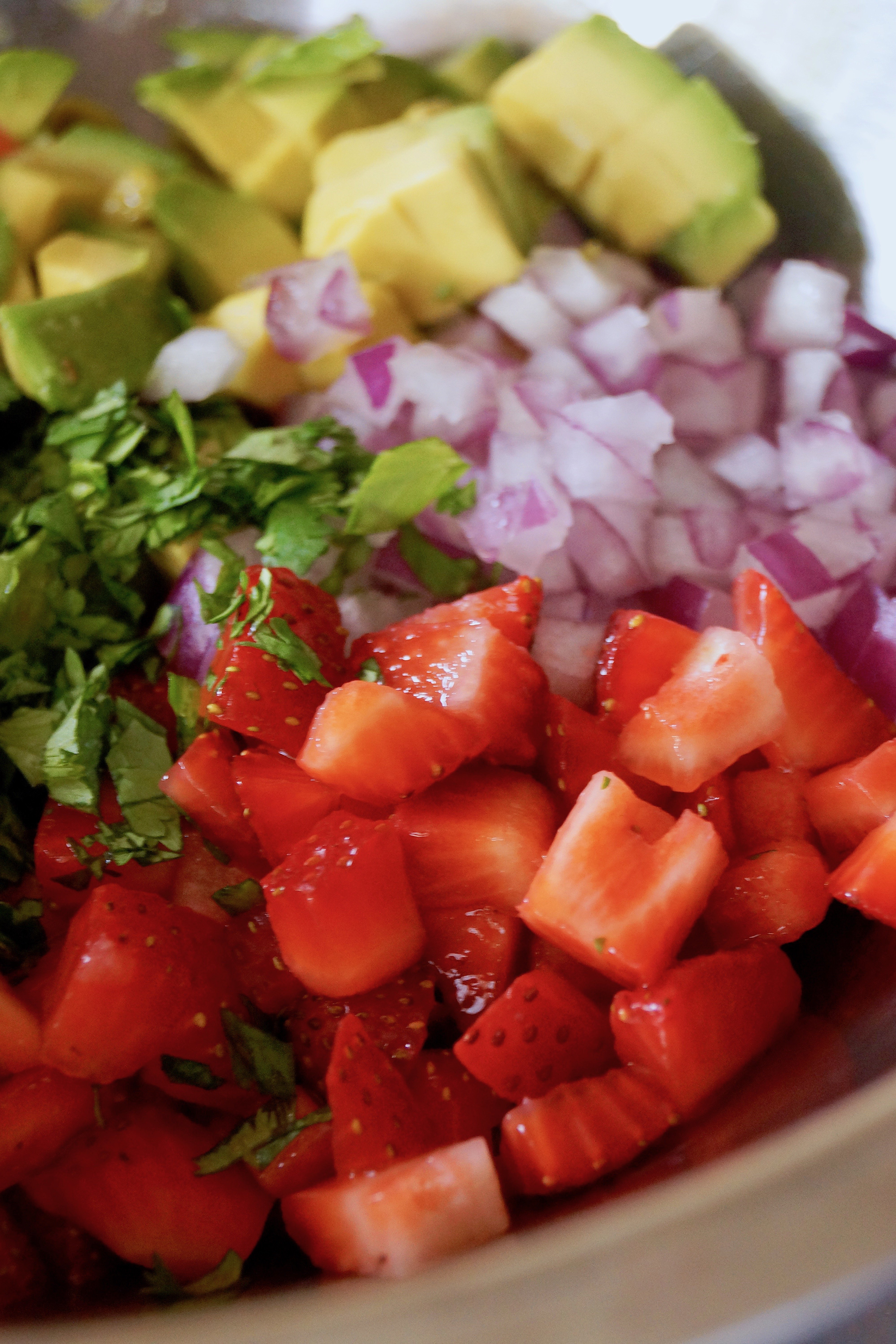 Strawberry Avocado Salsa recipe ingredients chopped and in a bowl