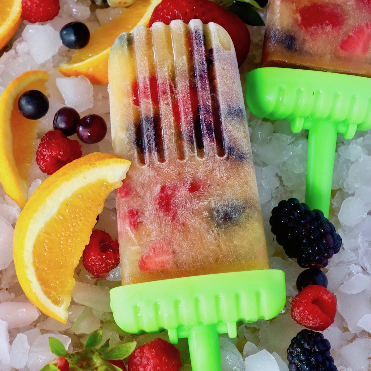 Orange Popsicles with Berries