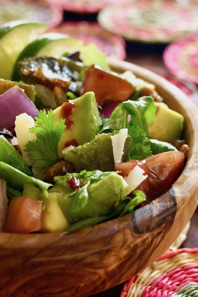 Chopped Mexican Salad with Pepitas in a wooden bowl