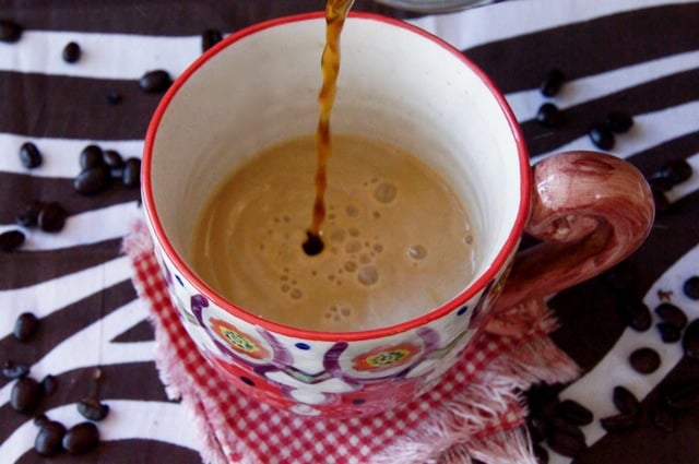 This is how to make coffee with half and half -- coffee being poured into the half and half 