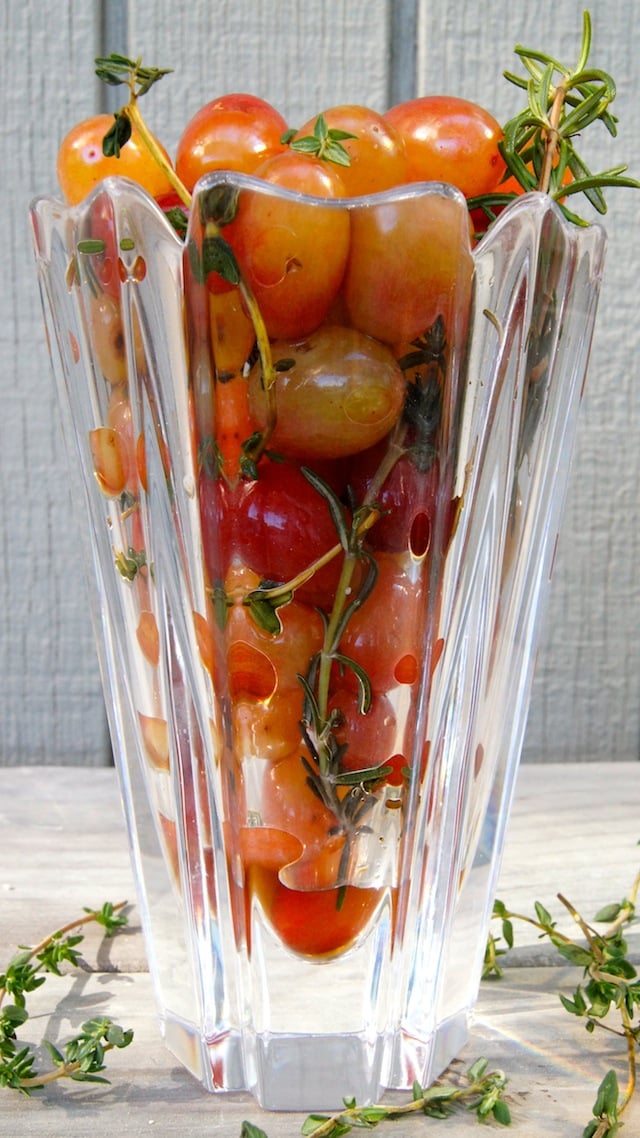 Wine Marinated Grapes in tall glass with fresh herbs