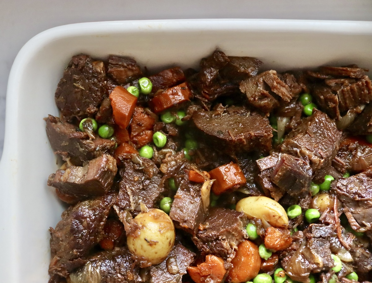 Braised-Brisket-Casserole Beef brisket stew in a casserole dish.