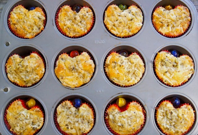 heart-shaped Potato-Asiago Muffins with Herbs de Provence in muffin tin