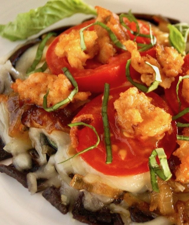 Close up of Portobello Mushroom Pizza with basil leaves