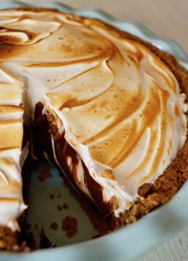 Peanut Butter Chocolate Meringue Pie with one slice removed