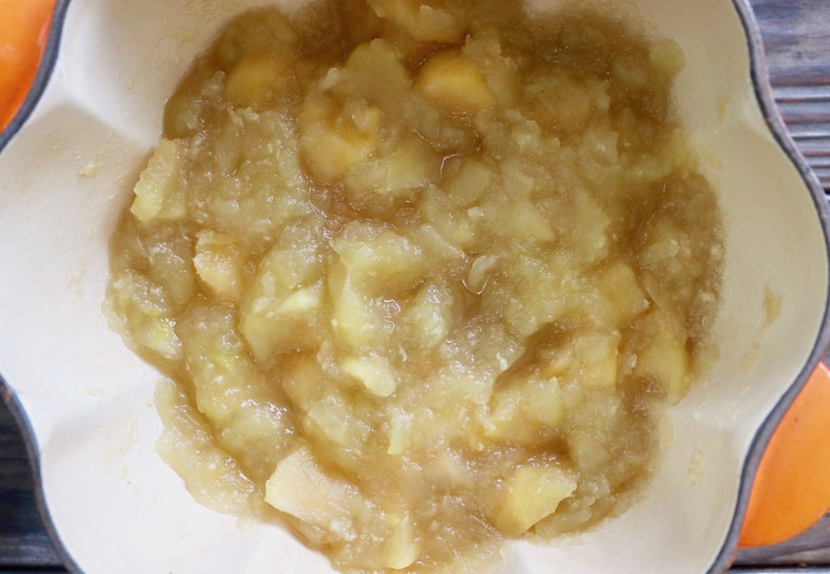 Large pot with chunky applesauce.