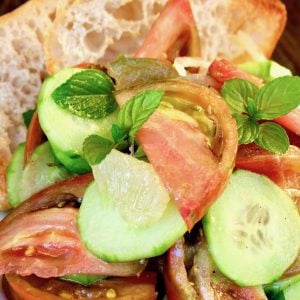 tomato cucumber salad on crusty bread