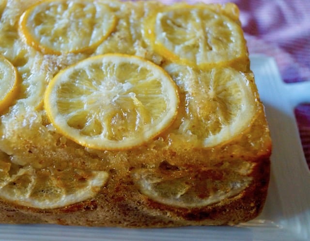 Close up, unsliced half of Gluten-Free Meyer Lemon Cake with Olive Oil.