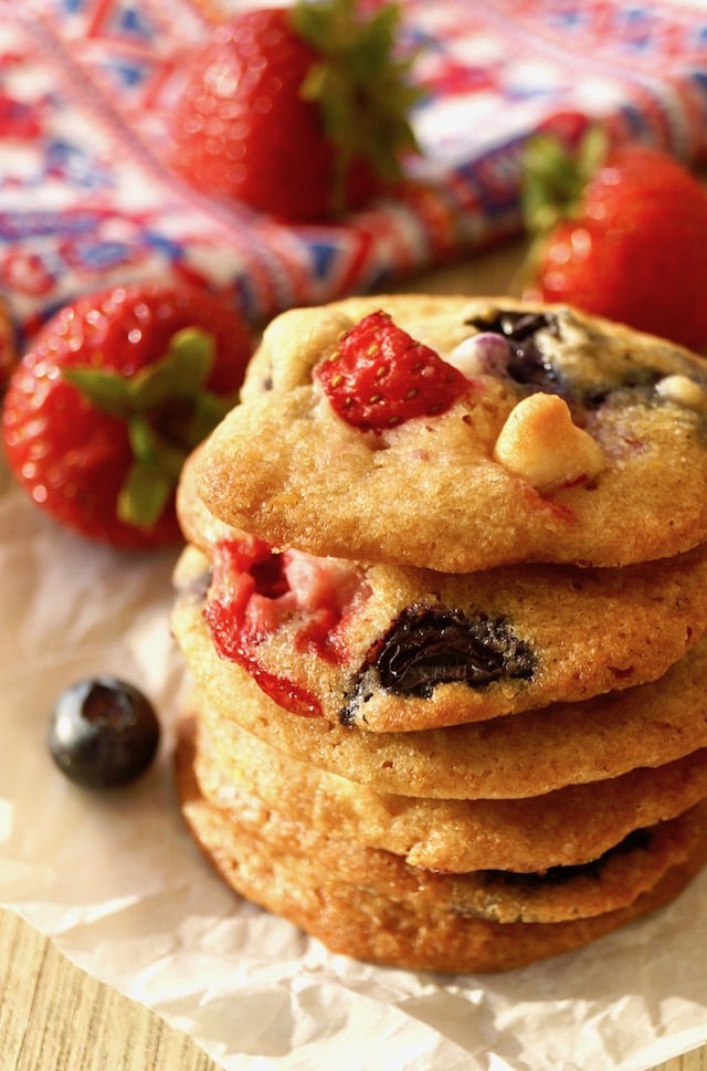 Close up of a small stack of Strawberry-Blueberry White Chocolate Chip cookies.