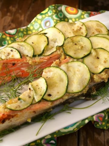 California King Salmon Recipe with thinly sliced zucchini rounds on top