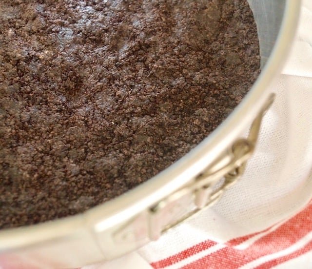 Oreo Cookie crust pressed into springform pan