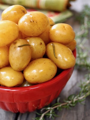 Baby Confit Potatoes in a red bowl