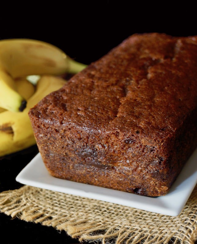 Whole Gluten-Free Banana Chocolate Chip Cake on a white plate