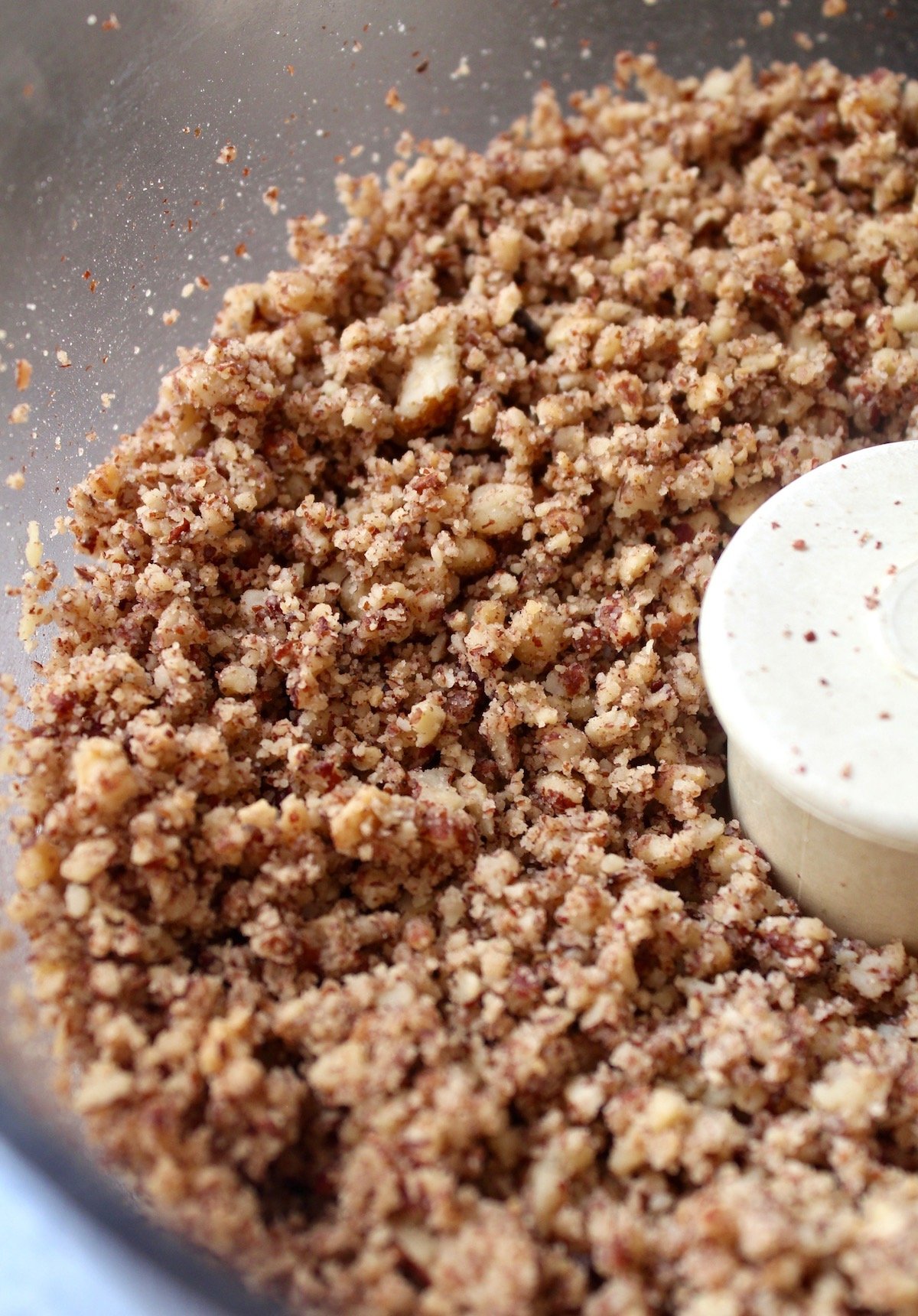 finely ground pecans in a food processor