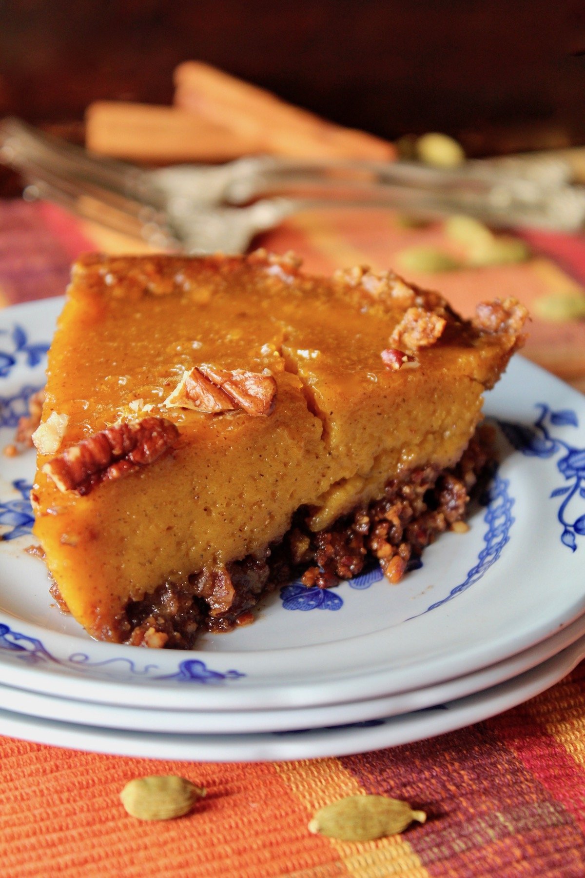 close up of a slice of pumpkin pie