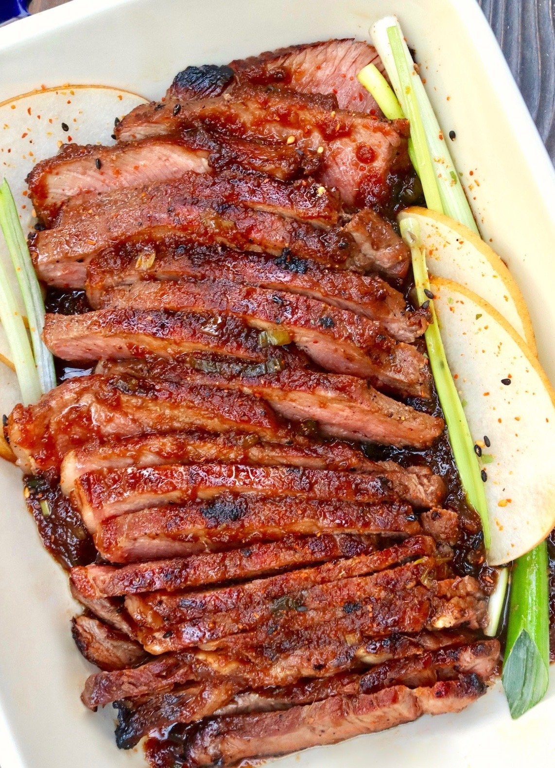 thinly sliced seared rib-eye steak with asisan pear slices