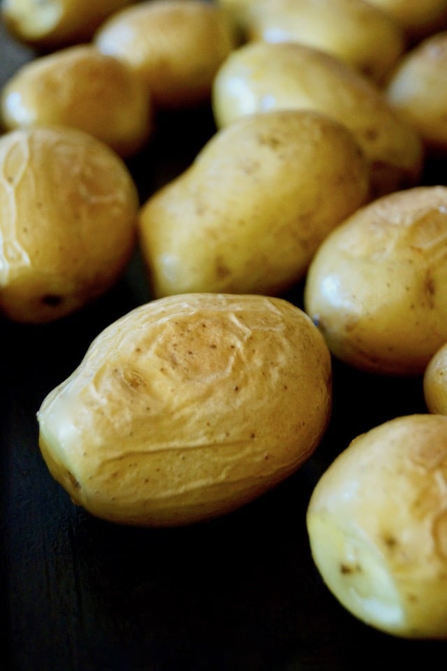 Roasted Baby Dutch Yellow Potatoes on a sheet pan.