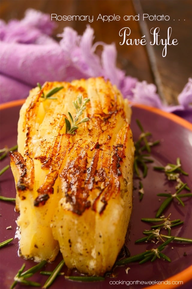 Rosemary Apple Potatoes, Pave Style on a purple plate with a cloth purple napkin