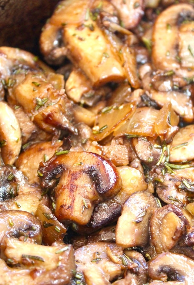 Caramelized sliced mushrooms in saute pan