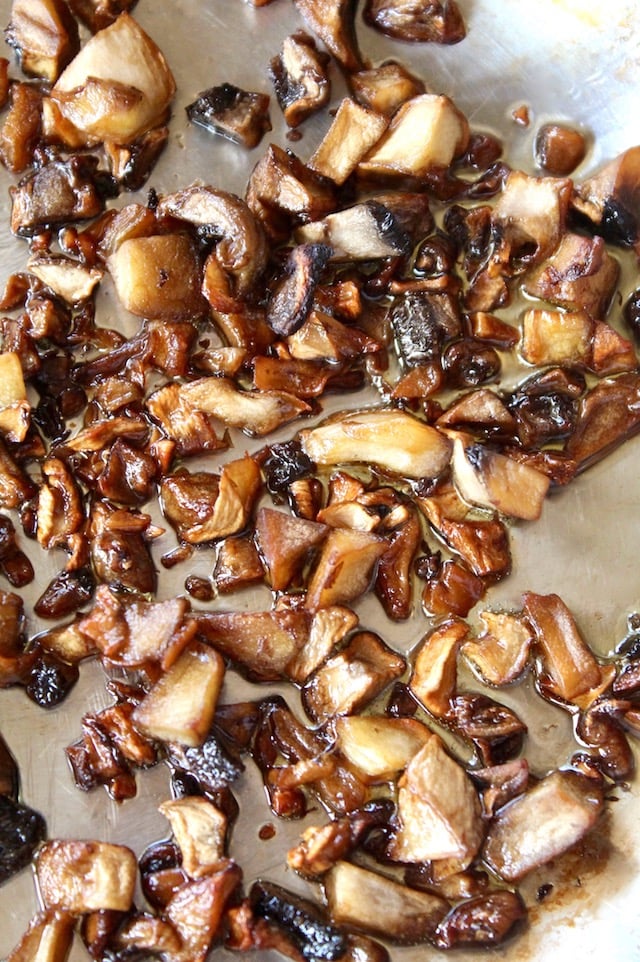 crispy, browned, finely chopped mushrooms in saute pan