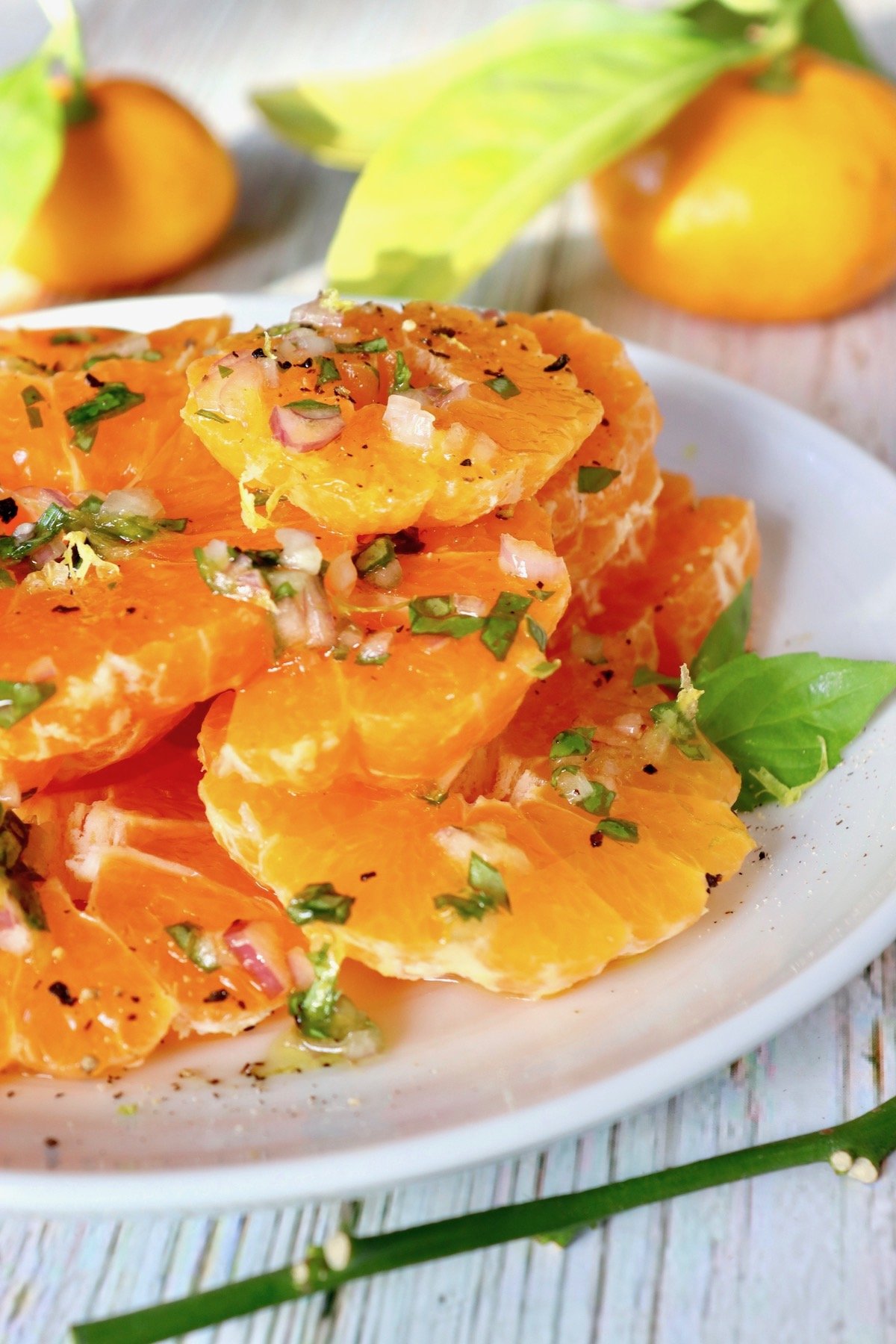 white plate full with round slices of Satsumas