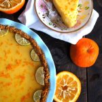 orange key lime pie in a light blue pie plate