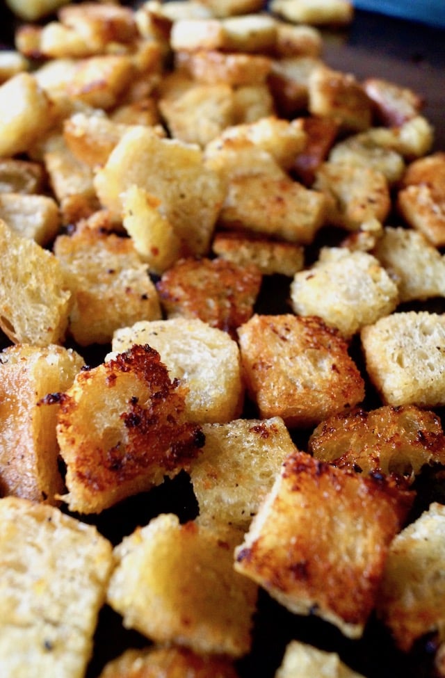 Lemon Garlic Roasted Croutons on a baking sheet