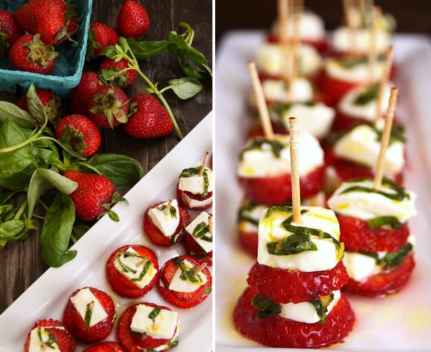 Lemon-Basil Strawberry Caprese with toothpicks on a narrow white plate with fresh berries in background.