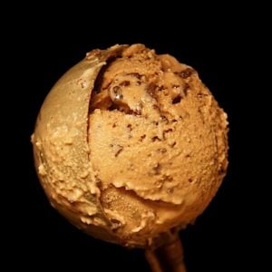 one large scoop on espresso chocolate ice cream in copper scooper