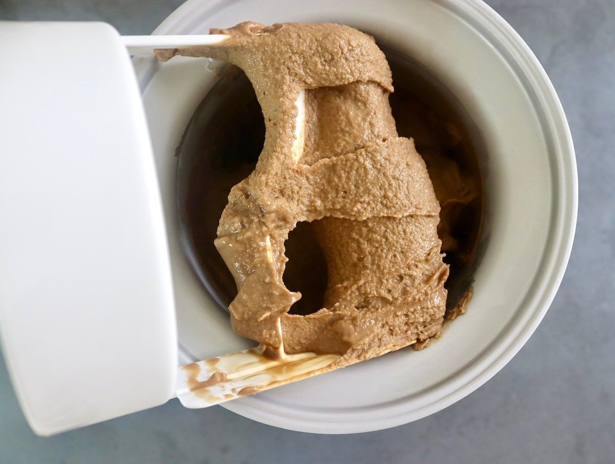 Churned espresso gelato in ice cream machine.