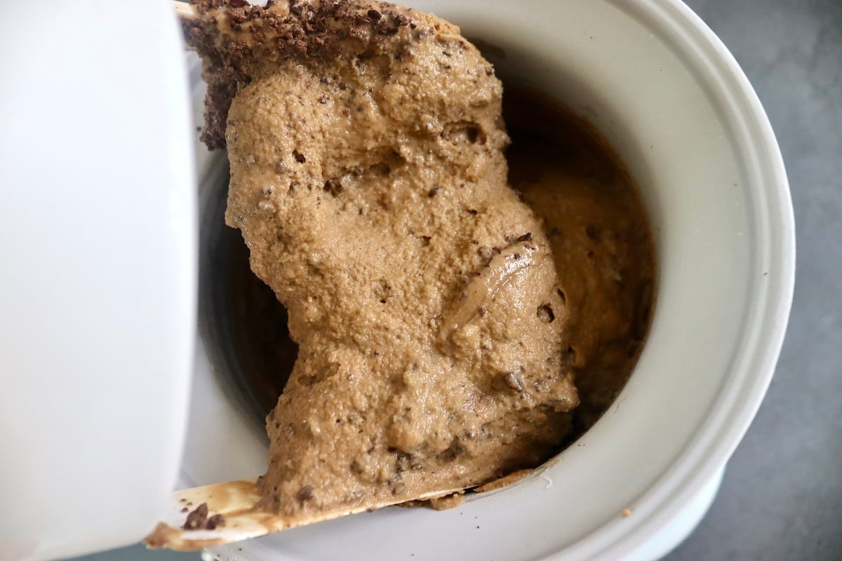 Churned espresso chip gelato in ice cream machine.