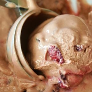 Fat Free Cherry Frozen Yogurt being scooped with ice cream scooper