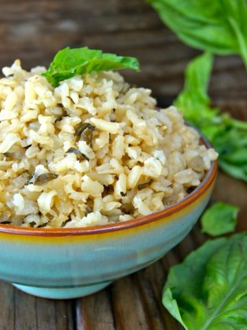 Roasted Garlic-Basil Brown Rice in mint green ceramic bowl