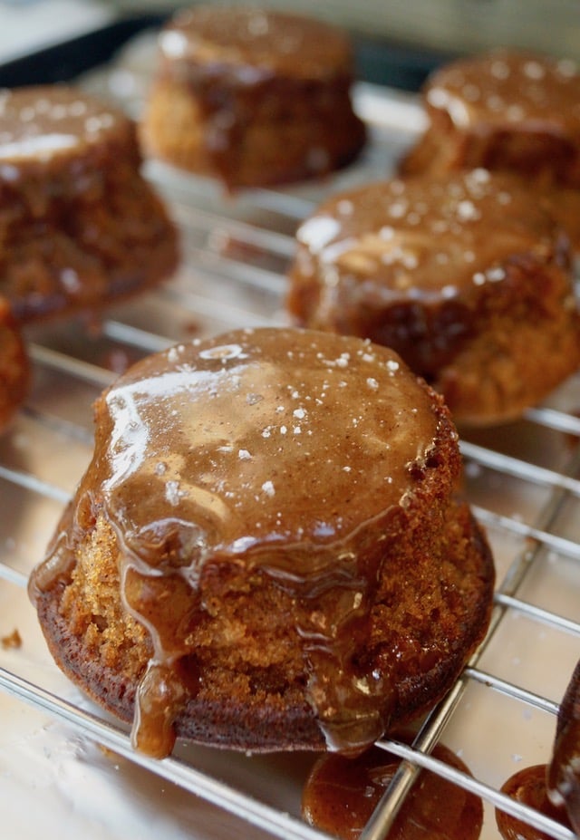 caramel covered potato cakes on cooling rack