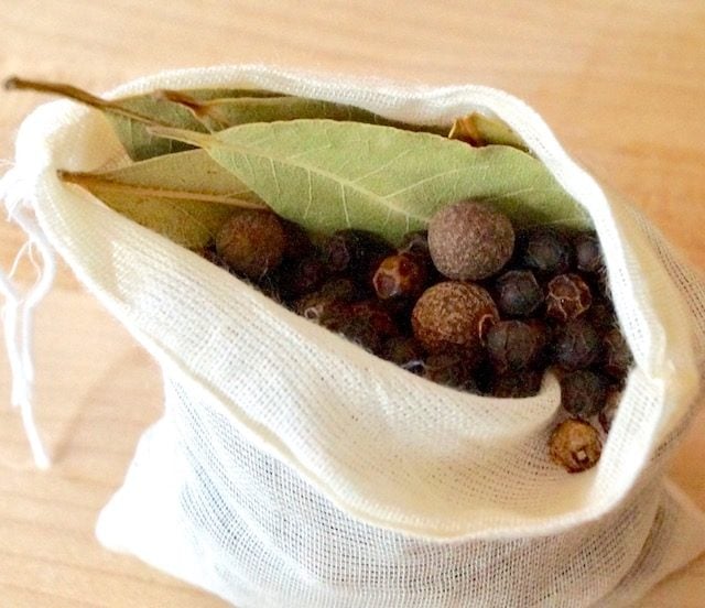 open chesecloth bag with spices for brine