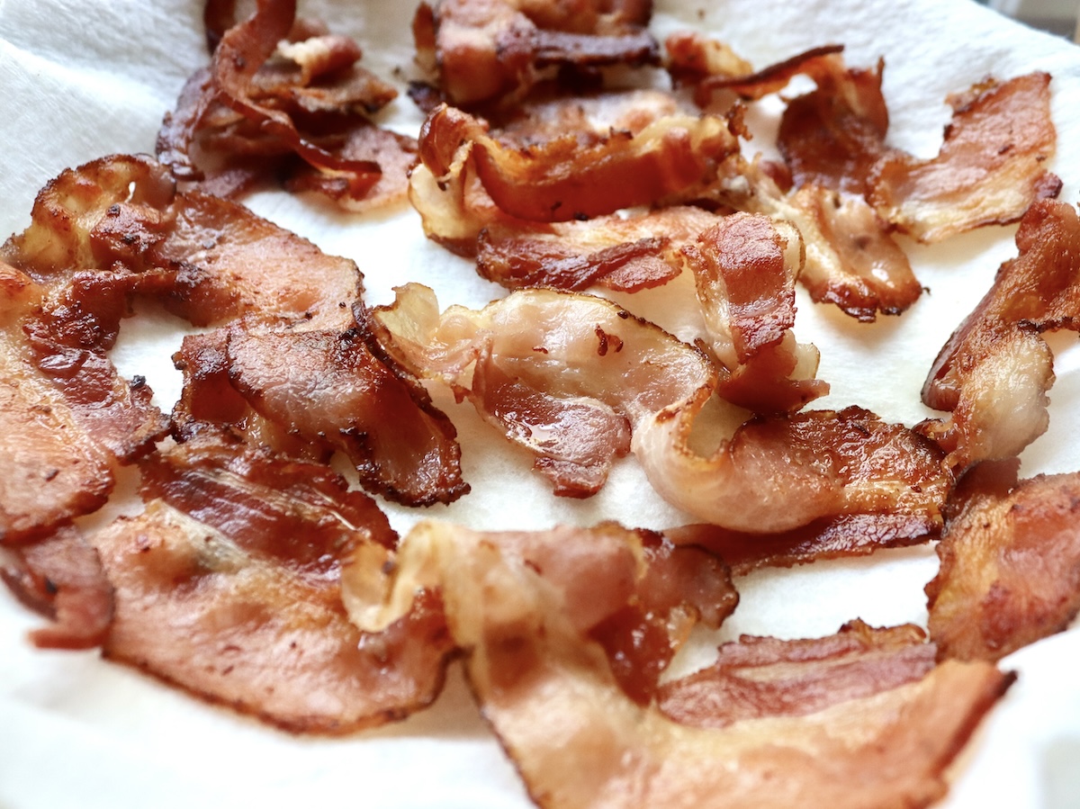 Crispy bacon on paper towel.