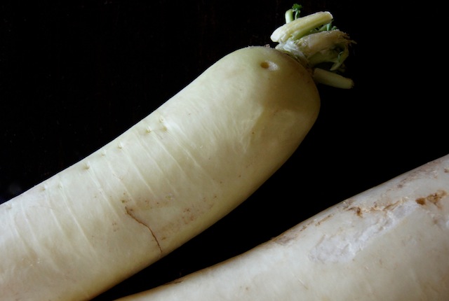 4 segments of a peeled Daikon radish.