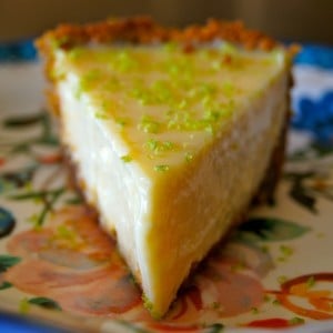 One slice of Citrus Ginger Pie on a floral plate