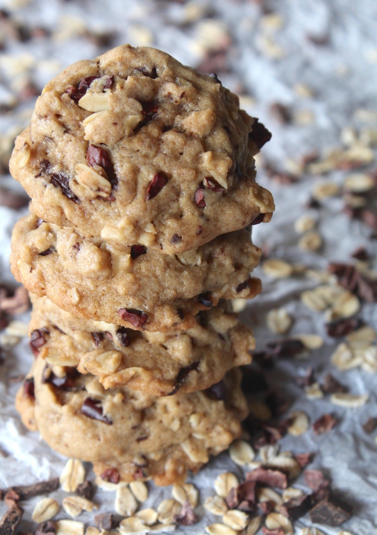 stack of three cookies with cacao nibs, oatmeal and chocolate