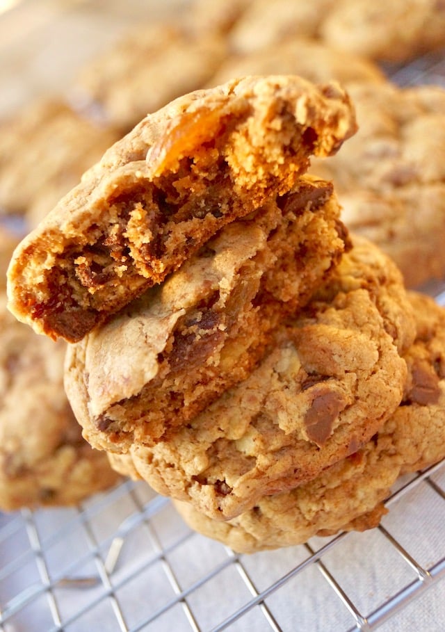 stack of 4 oatmeal raisin chocolate chip cookies with top cookin in piceces