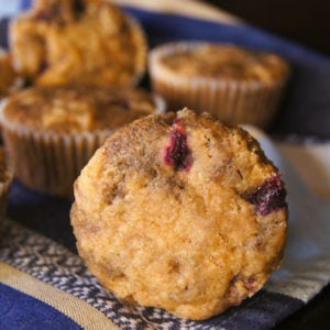 front of a blueberry blue corn muffin on its side