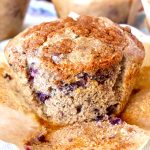 One jumbo-sized blueberry chocolate chip muffin made with blue cornmeal.