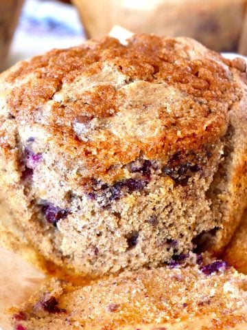 One jumbo-sized blueberry chocolate chip muffin made with blue cornmeal.