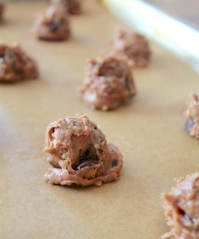 shaped raw cookie dough for hazelnut chocolate cookies