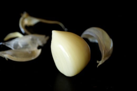 One peeled clove of Elephant Garlic.