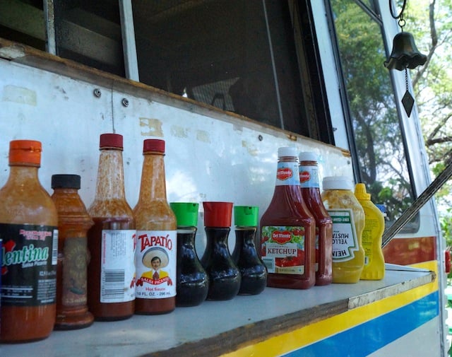 outside shelf with sauces at Da Fish House food truck