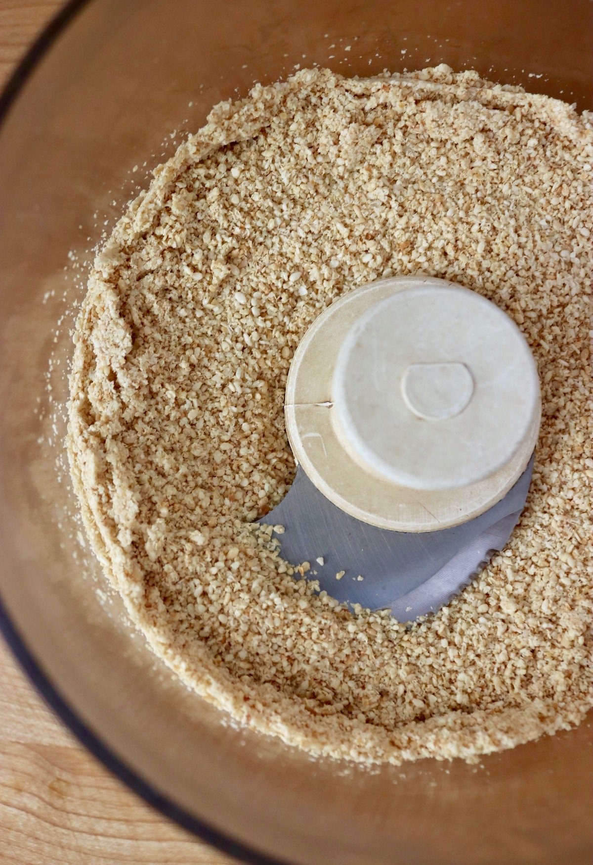Powdered sesame seeds in food processor.