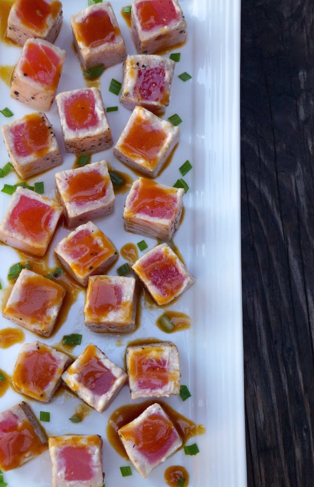 Wasabi Glazed Seared Ahi Tuna Appetizer Recipe on a white platter with chives