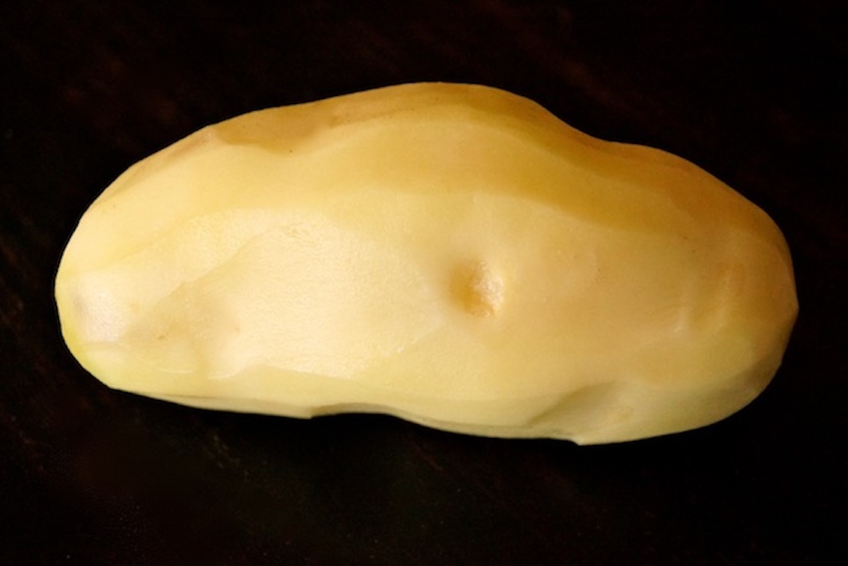 One whole peeled Russet potato.